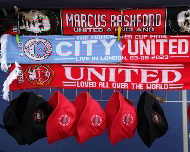 Scarves and hats for sale outside ahead of the Emirates FA Cup final at Wembley Stadium (Pic: Nick Potts/PA Wire)