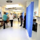 Staff on an NHS hospital ward. Photo: Peter Byrne/PA Wire