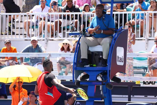 Nick Kyrgios of Australia argues with ATP chair umpire Carlos Bernardes of Brazil during the first set in his match against Jannik Sinner of Italy during the Miami Open at Hard Rock Stadium on March 29, 2022.