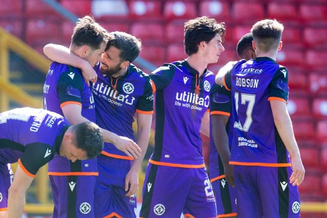 Dundee United celebrate Marc McNulty's opener at Pittodrie.