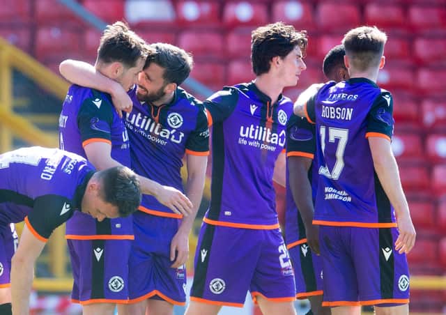 Dundee United celebrate Marc McNulty's opener at Pittodrie.