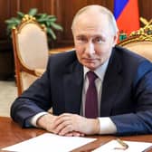 Russia's President Vladimir Putin attends a meeting with acting governor of the Bryansk region in Moscow on May 13. (Photo by Mikhail METZEL / POOL / AFP via Getty Images)