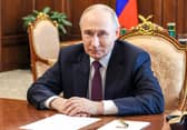 Russia's President Vladimir Putin attends a meeting with acting governor of the Bryansk region in Moscow on May 13. (Photo by Mikhail METZEL / POOL / AFP via Getty Images)