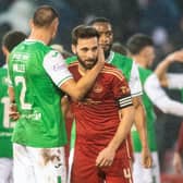 Hibs' Lewis Miller and Aberdeen's Graeme Shinnie at full time after a 2-2 draw between the two at Pittodrie.