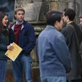 Actress Meg Bellamy, who plays Kate Middleton, and actor Ed McVey, who plays the part of Prince William, film scenes for the next season of The Crown in St Andrews in