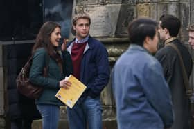 Actress Meg Bellamy, who plays Kate Middleton, and actor Ed McVey, who plays the part of Prince William, film scenes for the next season of The Crown in St Andrews in