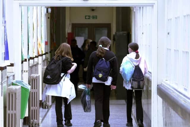 File photo of children in a school corridor.