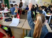 Early Learning and Childcare sector calls on Scottish Government for clear guidance amid closures and struggles for key workers. (Photo credit: Fred Tanneau/AFP)