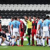 A historical, pre-woke image of St Mirren and Ross County engaging in handbags when doubtless some of the Buddies thought the County man on the ground was being a drama queen.