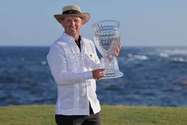 Matt Wallace poses with the trophy after winning the Corales Puntacana Championship at Puntacana Resort & Club, Corales Golf Course in Punta Cana. Picture: Jonathan Bachman/Getty Images.