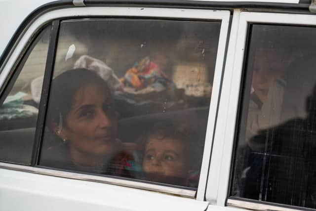 A car of ethnic Armenians from Nagorno-Karabakh fleeing the enclave this week.