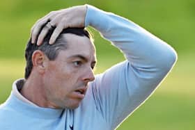 Rory McIlroy reacts after holing a ten-foot par putt on the 18th green at Royal Liverpool in the first round of the 151st Open. Picture: Glyn Kirk/AFP via Getty Images.