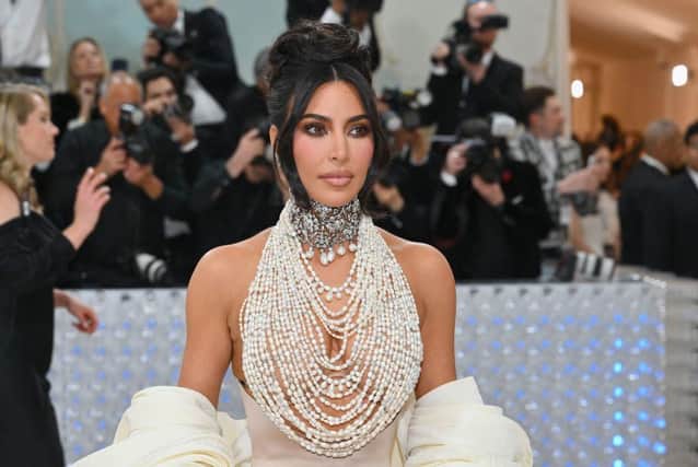 Is Kim Kardashian one of the richest celebrities in the world? (Photo by ANGELA WEISS / AFP) (Photo by ANGELA WEISS/AFP via Getty Images)