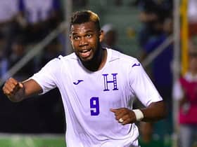 Jorge Benguche celebrates scoring for Honduras against Puerto Rico