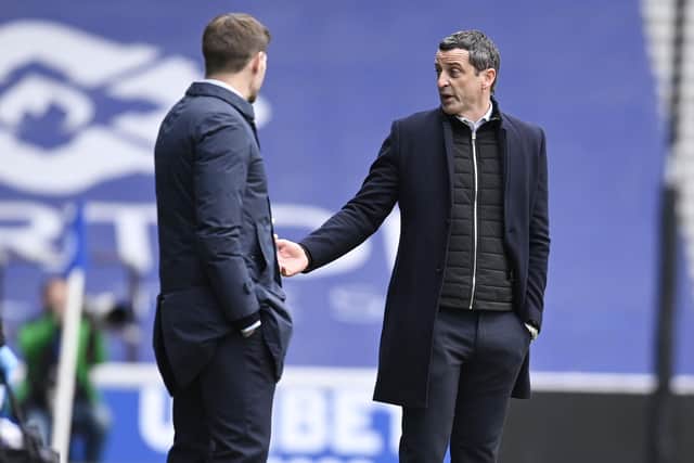 Rangers manager Steven Gerrard and Hibernian head coach Jack Ross during a Scottish Premiership match between Rangers and Hibernian at Ibrox Stadium, on April 11, 2021, in Glasgow, Scotland. (Photo by Rob Casey / SNS Group)