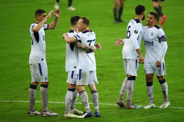 The Rangers team celebrate victory following the UEFA Europa League Group D stage match between Standard Liege and Rangers at Stade Maurice Dufrasne (Photo by Dean Mouhtaropoulos/Getty Images)