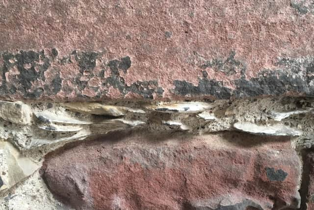 Workmen uncovered oyster shells in the walls of the ground floor of Gladstone's Land, a 17th Century tenement in the Royal Mile. PIC: NTS.