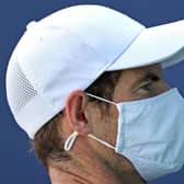 Andy Murray, wearing a face covering, practises at Queen's Club. Picture: Adrian Dennis/AFP via Getty Images