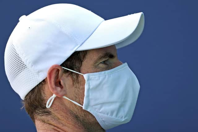 Andy Murray, wearing a face covering, practises at Queen's Club. Picture: Adrian Dennis/AFP via Getty Images