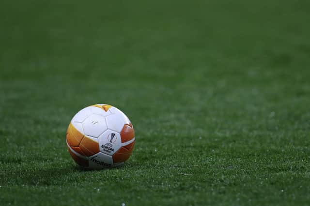 A Europa League football lies on the field before the UEFA Europa League 1st round day 2 Group D football match between Rangers FC and Lech Poznan at the Ibrox Stadium in Glasgow on October 29, 2020. (Photo by RUSSELL CHEYNE / POOL / AFP) (Photo by RUSSELL CHEYNE/POOL/AFP via Getty Images)