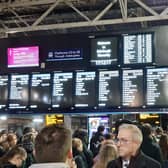 Passengers awaiting updates during the major disruption at Edinburgh Waverley Station last night. (Photo by Alastair Dalton/The Scotsman)