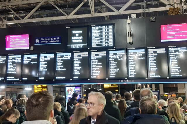 Passengers awaiting updates during the major disruption at Edinburgh Waverley Station last night. (Photo by Alastair Dalton/The Scotsman)