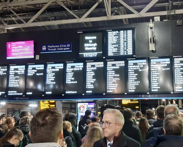Passengers awaiting updates during the major disruption at Edinburgh Waverley Station last night. (Photo by Alastair Dalton/The Scotsman)