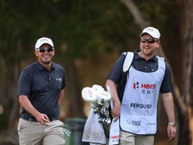 Ewen Ferguson has a laugh with his caddie, fellow Scot Stephen Neilson, during the pro-am ahead of the Hero Cup at Abu Dhabi Golf Club. Picture: Andrew Redington/Getty Images.