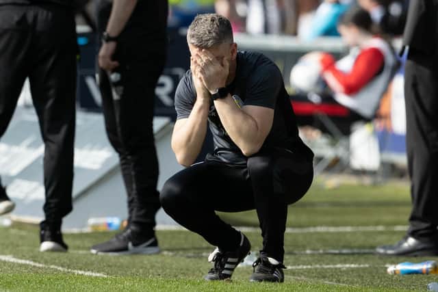 St Mirren manager Stephen Robinson dejected after Hearts win a late penalty.  (Photo by Alan Harvey / SNS Group)