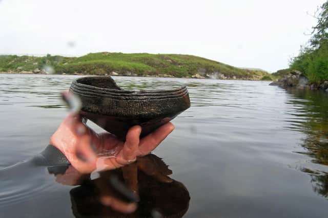 One of the first pots, an Unstan Bowl to be discovered in Loch Arnish, Scotland. Picture: Chris Murray/PA Wire