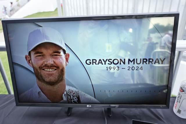 A golf television broadcast is played at the broadcast tent showing a photo of Grayson Murray during the third round of the Charles Schwab Challenge golf tournament at Colonial Country Club in Fort Worth, Texas.
