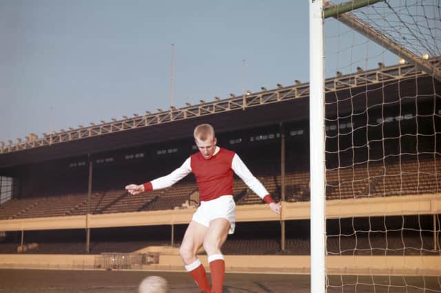 Ian Ure poses for an action shot during the 1963/64 season at Arsenal - he had just moved for a world record fee from Dundee (Photo by Don Morley/Allsport/Getty Images)