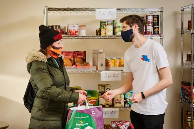 Pictured left to right are customer Dawn Pocklington with Dave Burrell at Places for People Scotland’s The Pantry in Craigmillar, Edinburgh last month.