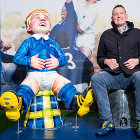 Doddie Weir with the Oor Doddie statue  at BT Murrayfield, in 2019.