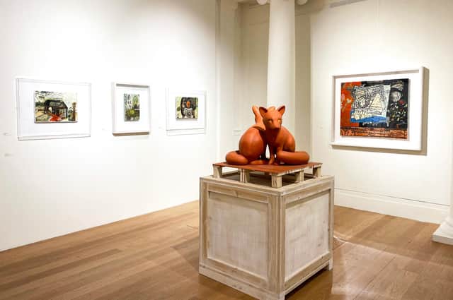 Installation shot of the RSA Christmas show, with Kenny Hunter's Fox x 2 and and works by Lennox Dunbar
