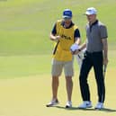 Martin Laird is handed his ball by fellow Sco Kevin McAlpine as he prepares to putt on the 17th hole during the second round of the 2021 PGA Championship at Kiawah Island. Picture: Sam Greenwood/Getty Images.