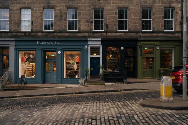 Independent shops on a cobbled street in Edinburgh’s New Town – small businesses like these face rising costs amid a 31% year-on-year increase in Scottish insolvencies.