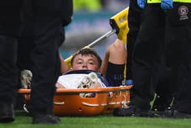 Scotland's Nathan Patterson leaves the field on a stretcher during the Nations League match against Ukraine at Hampden Park.  (Photo by Craig Foy / SNS Group)