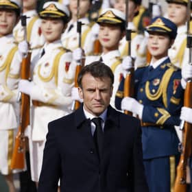 French President Emmanuel Macron was given the red-carpet treatment on his visit to China (Picture: Ludovic Marin/AFP via Getty Images)