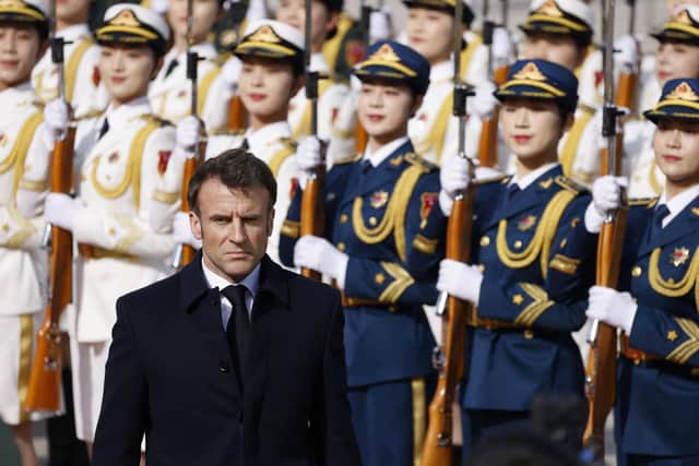 French President Emmanuel Macron was given the red-carpet treatment on his visit to China (Picture: Ludovic Marin/AFP via Getty Images)