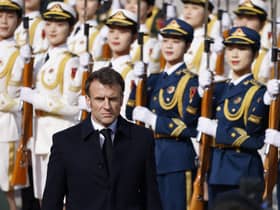 French President Emmanuel Macron was given the red-carpet treatment on his visit to China (Picture: Ludovic Marin/AFP via Getty Images)