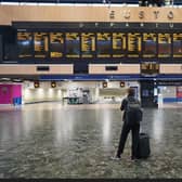 Passengers at Euston station in London, as members of the Rail, Maritime and Transport union begin their nationwide strike