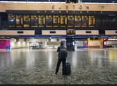 Passengers at Euston station in London, as members of the Rail, Maritime and Transport union begin their nationwide strike