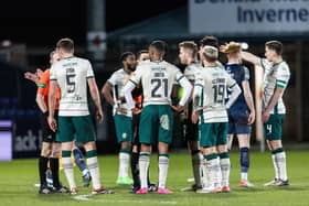 Hibs players surround referee David Munro at full-time after conceding an injury-time equaliser to Ross County. (Photo by Mark Scates / SNS Group)