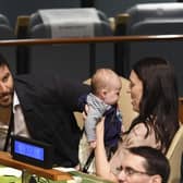 Jacinda Ardern holds her daughter Neve during the Nelson Mandela Peace Summit at the United Nations in 2018 (Picture: Don Emmert/AFP via Getty Images)