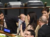 Jacinda Ardern holds her daughter Neve during the Nelson Mandela Peace Summit at the United Nations in 2018 (Picture: Don Emmert/AFP via Getty Images)