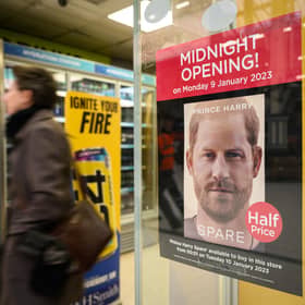 A poster advertising the launch of Prince Harry's memoir, Spare, on sale from today, is seen in a shop window (Picture: Leon Neal/Getty Images)
