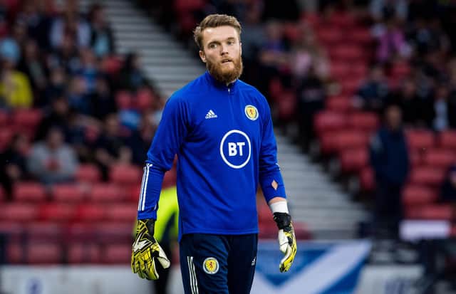 St Johnstone keeper  Zander Clark warms up for Scotland ahead of last month's  World Cup qualifying win over Moldova, in what has now proved the briefest stint in the nation set-up. (Photo by Ross Parker / SNS Group)