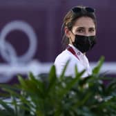 Jessica Springsteen walks the course ahead of the equestrian jumping individual qualifying in Tokyo. Picture: Carolyn Kaster/AP