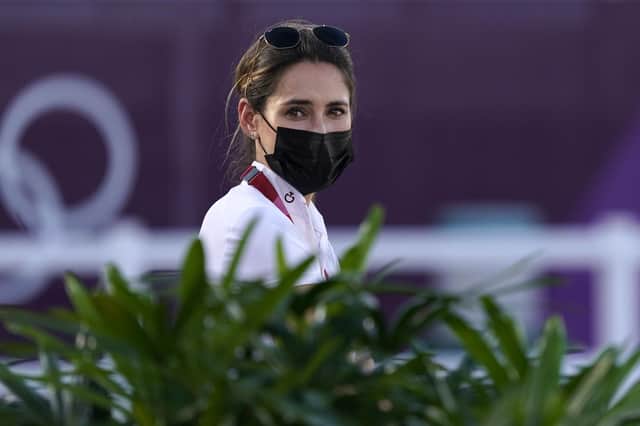 Jessica Springsteen walks the course ahead of the equestrian jumping individual qualifying in Tokyo. Picture: Carolyn Kaster/AP